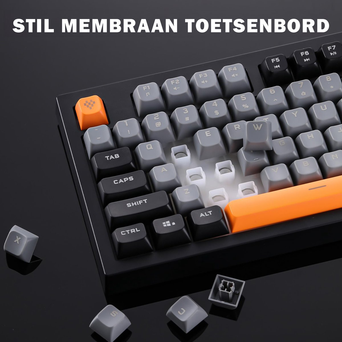 A close-up of a mechanical keyboard. Gray keys with white lettering are visible. Orange and black accents. Some keys are removed.