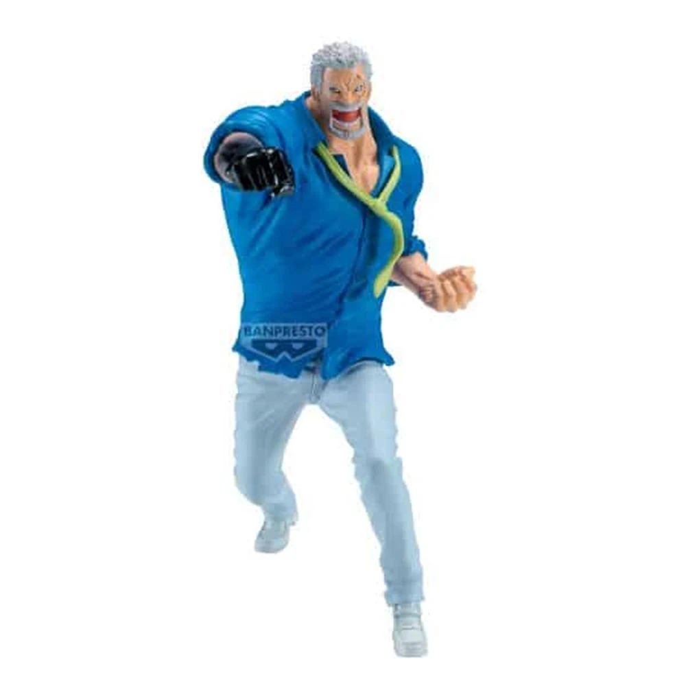 Una statuetta di un uomo con camicia blu, pantaloni bianchi e scarpe da ginnastica, con capelli grigi, barba e una posa dinamica, sembra in movimento.