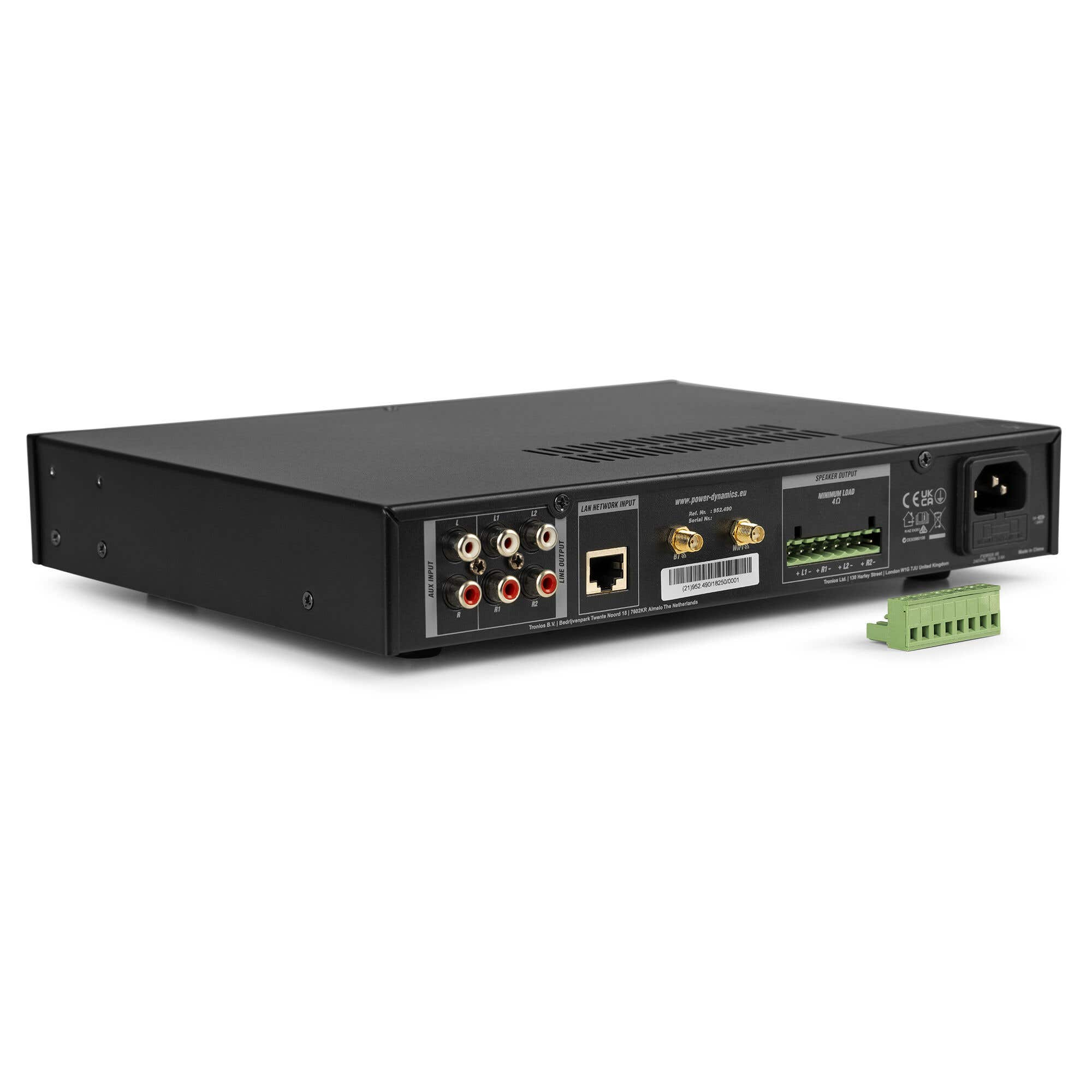 Un dispositivo de audio negro con puertos de entrada/salida, entrada de energía y un conector verde.