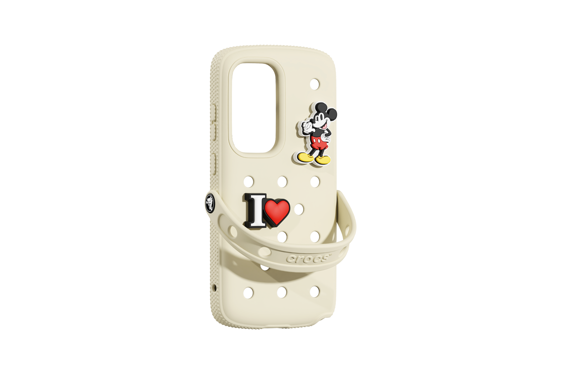 Una custodia per telefono color crema con Topolino e un design "I love". Ha il logo Crocs sul manico.