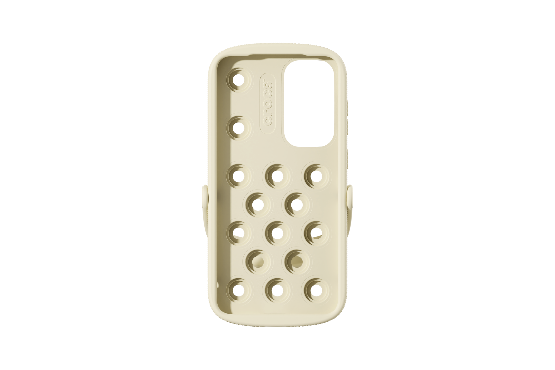 Una custodia per telefono color crema con fori rotondi, il logo Crocs e uno sfondo nero.