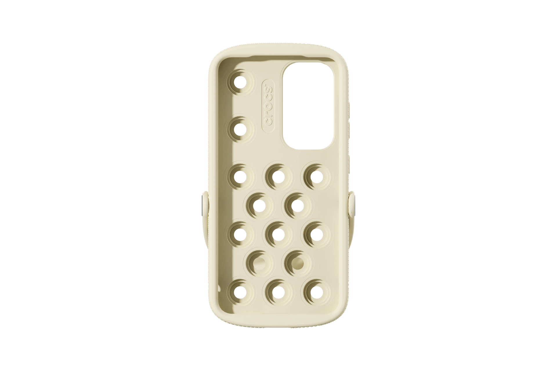 Una custodia per telefono color crema con più fori rotondi. Visibile il logo Crocs. Lo sfondo è nero.