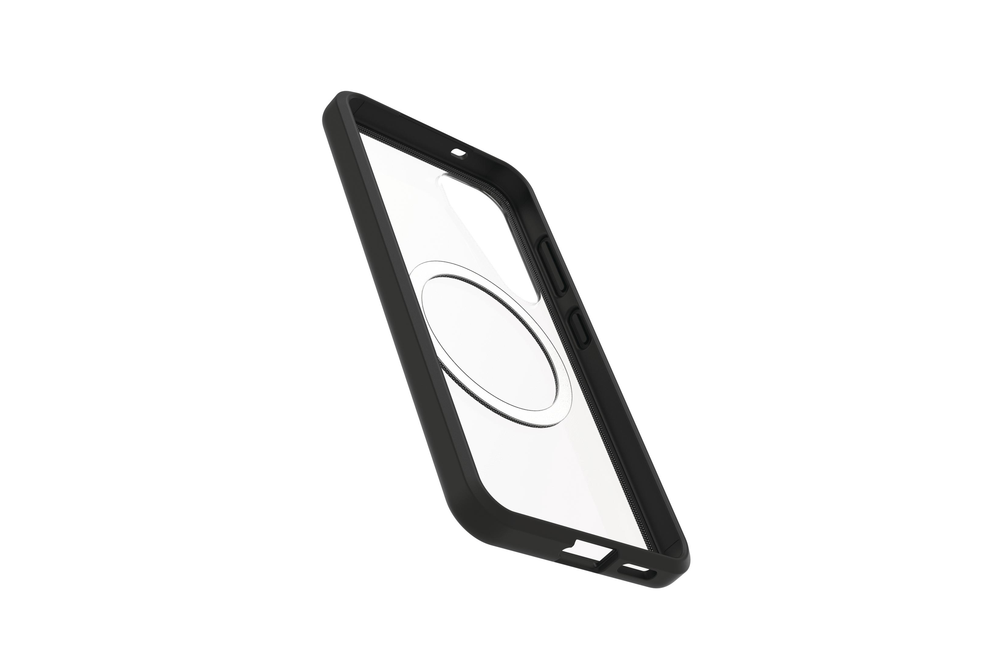 Una custodia trasparente per telefono con cornice nera e un anello di ricarica magnetico circolare bianco, inclinato a sinistra.