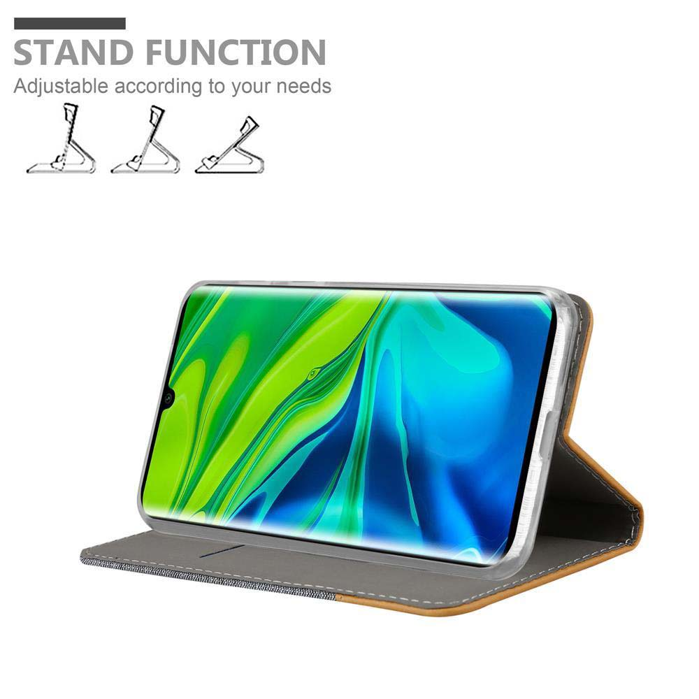 Ein Telefon in einer Hülle wird angezeigt. Der Bildschirm zeigt ein abstraktes Design in Grün und Blau. Text oben: 'Standfunktion'.