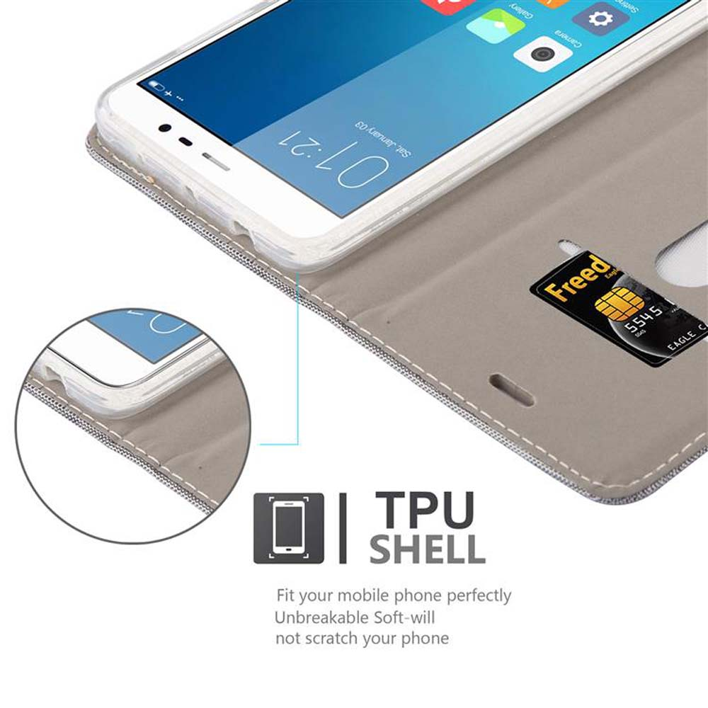 Ein weißes Smartphone in einer grauen Hülle mit einer Karte. Der Bildschirm zeigt die Uhrzeit 01:21. Text: TPU Shell.