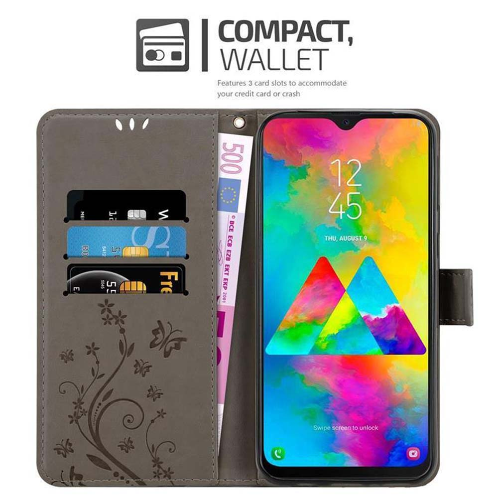 Un telefono in un portafoglio marrone è aperto. Lo schermo del telefono mostra grafiche colorate. Sono visibili carte di credito e una banconota da 500 euro.