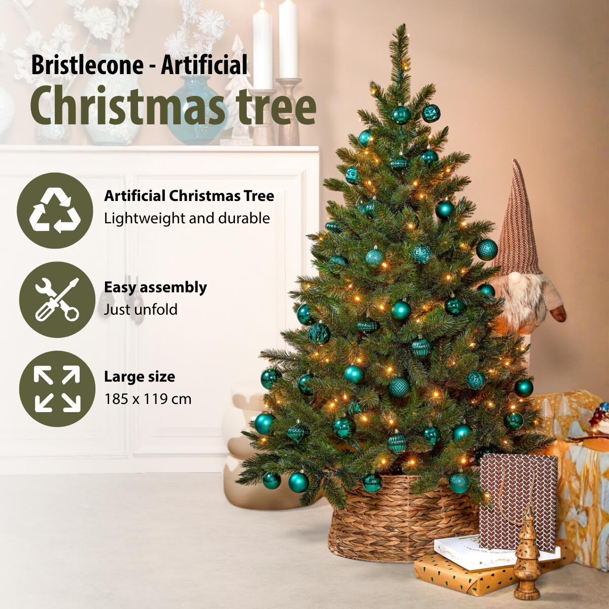 An artificial Christmas tree decorated with teal ornaments and lights. It sits in a woven basket. Gifts are nearby.