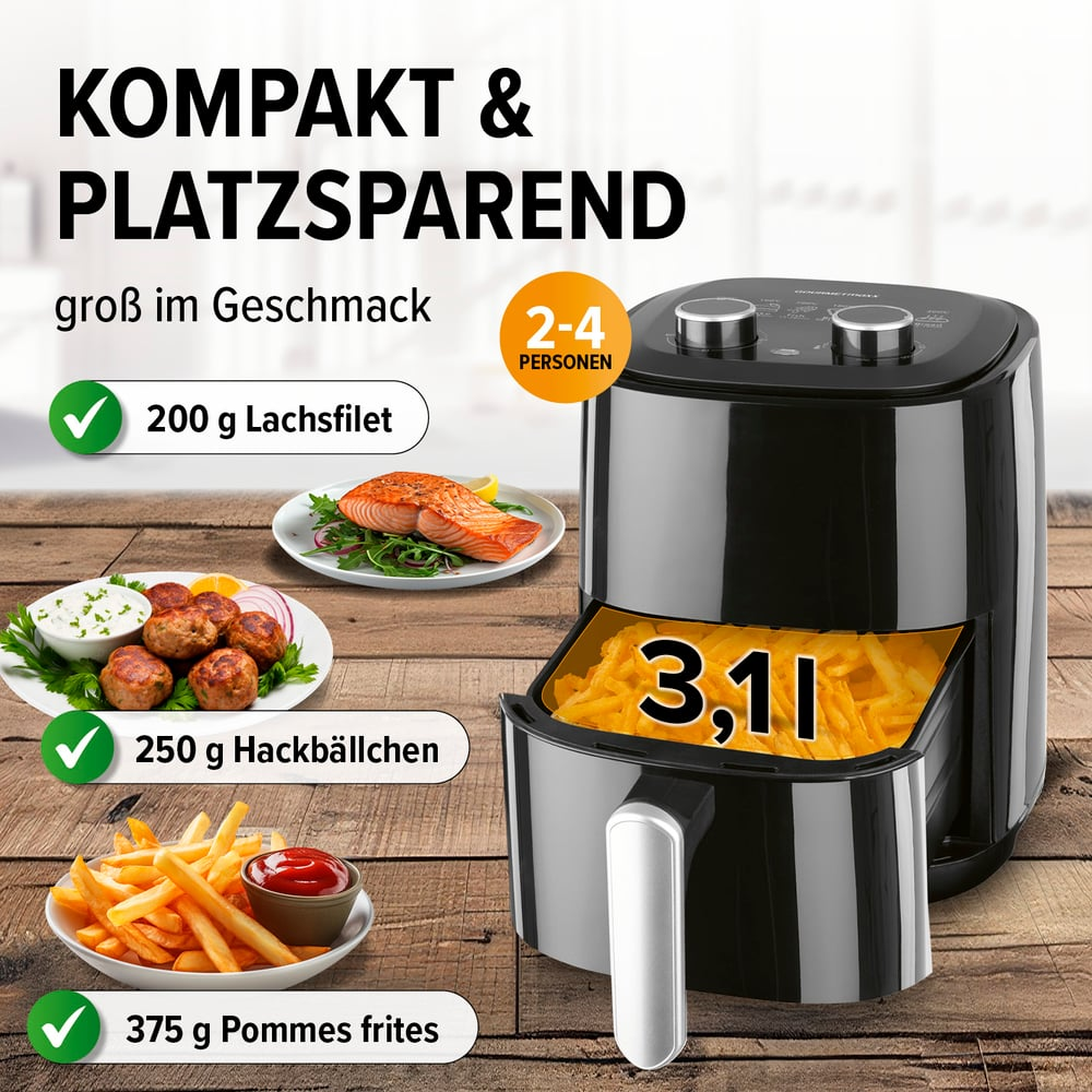 Schwarze Heißluftfritteuse mit Pommes Frites. Lachs, Fleischbällchen und Pommes werden ebenfalls gezeigt. Text: 'Kompakt & Platzsparend'.