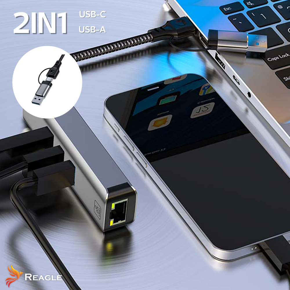 Kabel 2 w 1 USB-C i USB-A jest podłączony do laptopa i smartfona. Obecny jest również srebrny adapter z portem Ethernet.