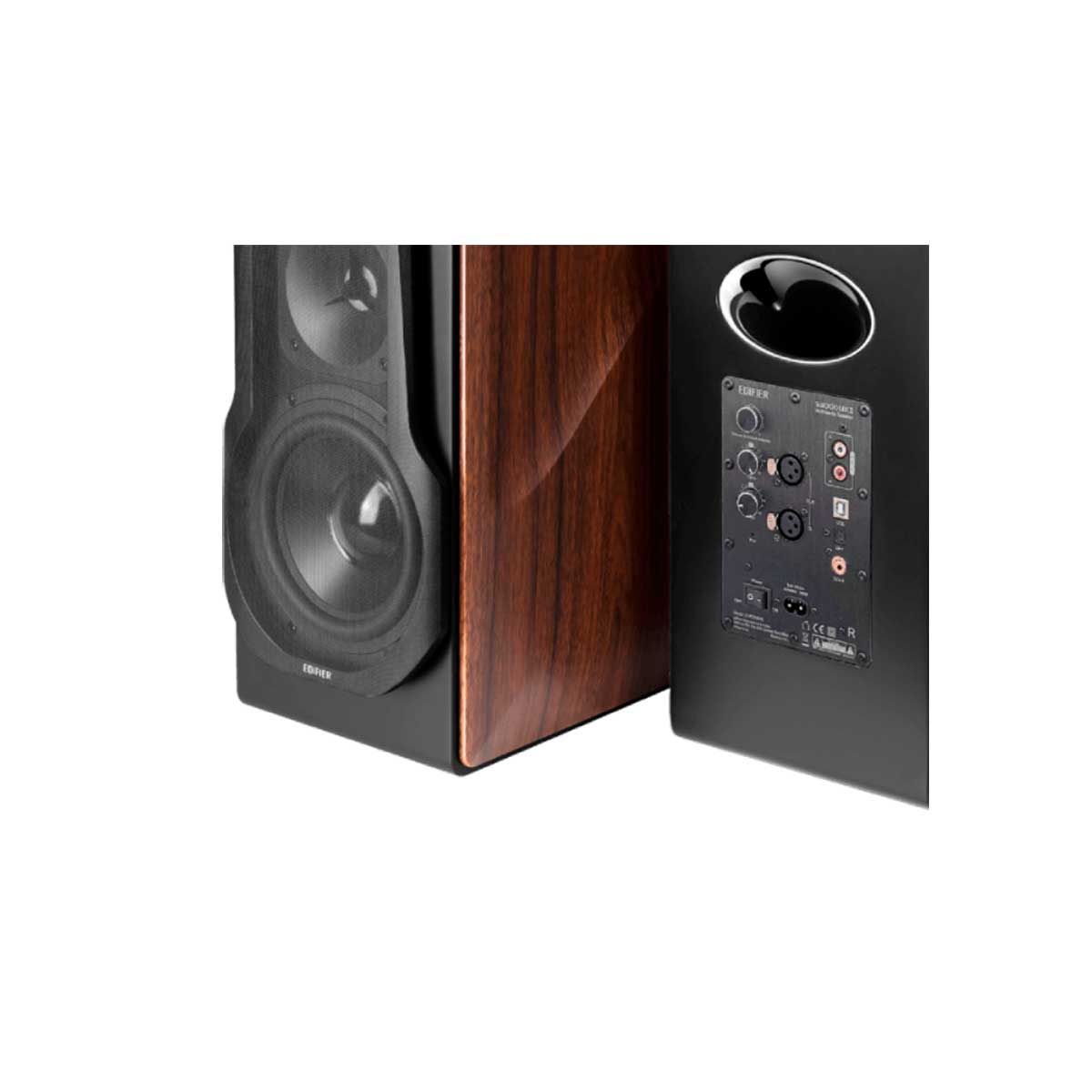 Dwa głośniki, jeden czarny z głośnikiem, a drugi brązowy. Tył czarnego głośnika ma elementy sterujące.