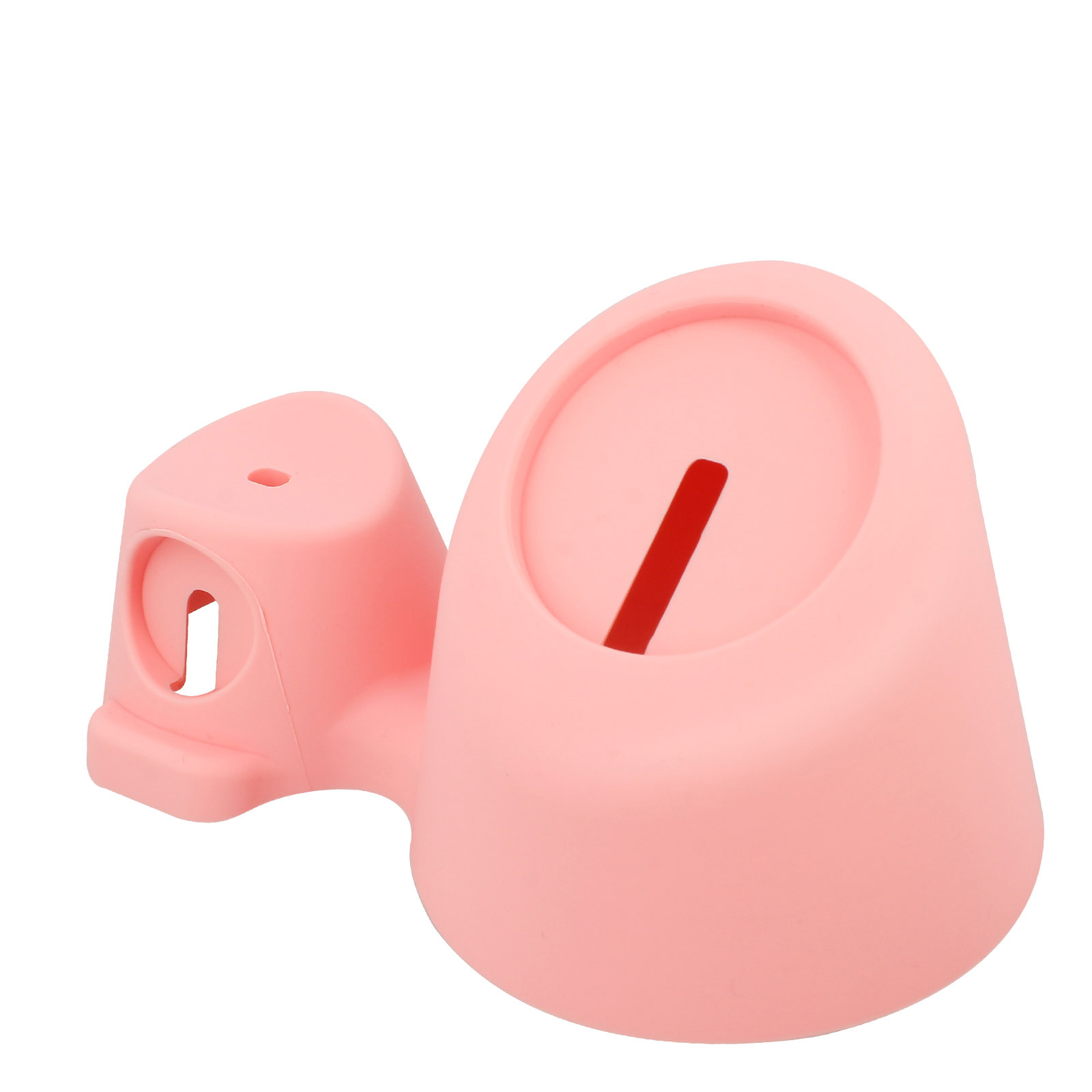Un accesorio de plástico rosa con una ranura. Tiene forma redondeada con otra parte adjunta.