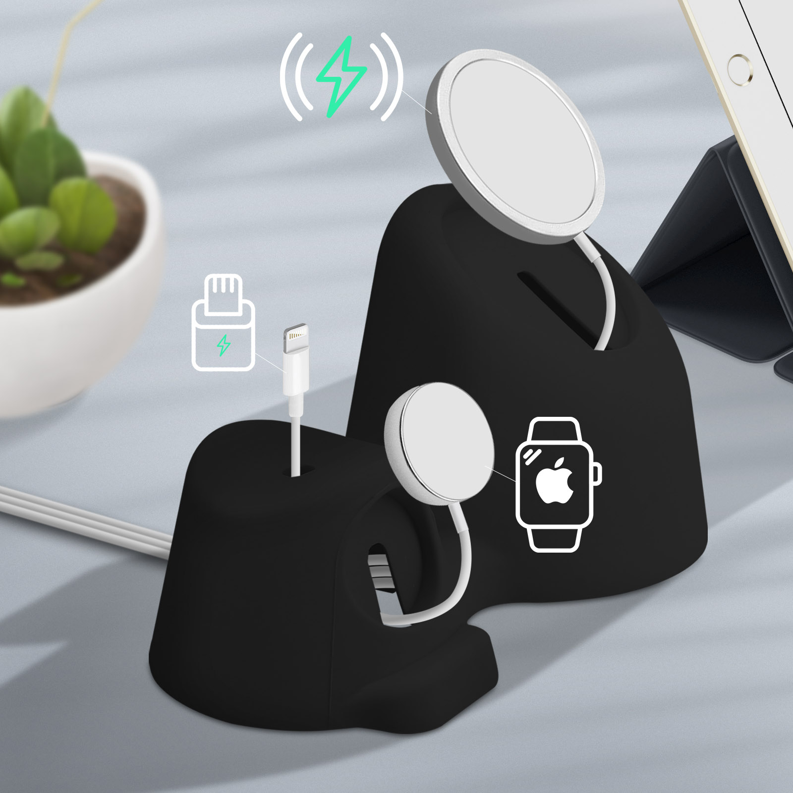 Estación de carga negra para dispositivos Apple. Incluye almohadillas de carga, un cable e iconos de energía y Apple Watch.