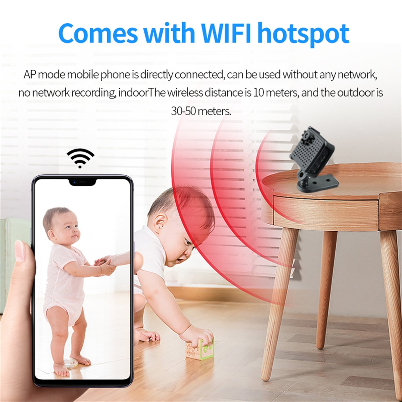 Ein Telefon zeigt ein Baby. Eine Kamera steht auf einem Tisch. Ein zweites Baby spielt mit einem Block. Drahtloses Signal.
