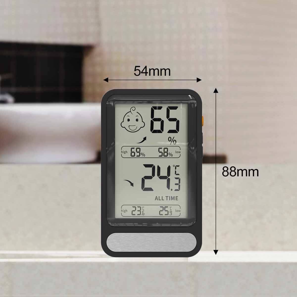 Ein schwarzes Thermometer zeigt 65 % Luftfeuchtigkeit und 24,3 °C Temperatur an. Es zeigt Höchst- und Tiefstwerte mit einem Babygesicht-Symbol.
