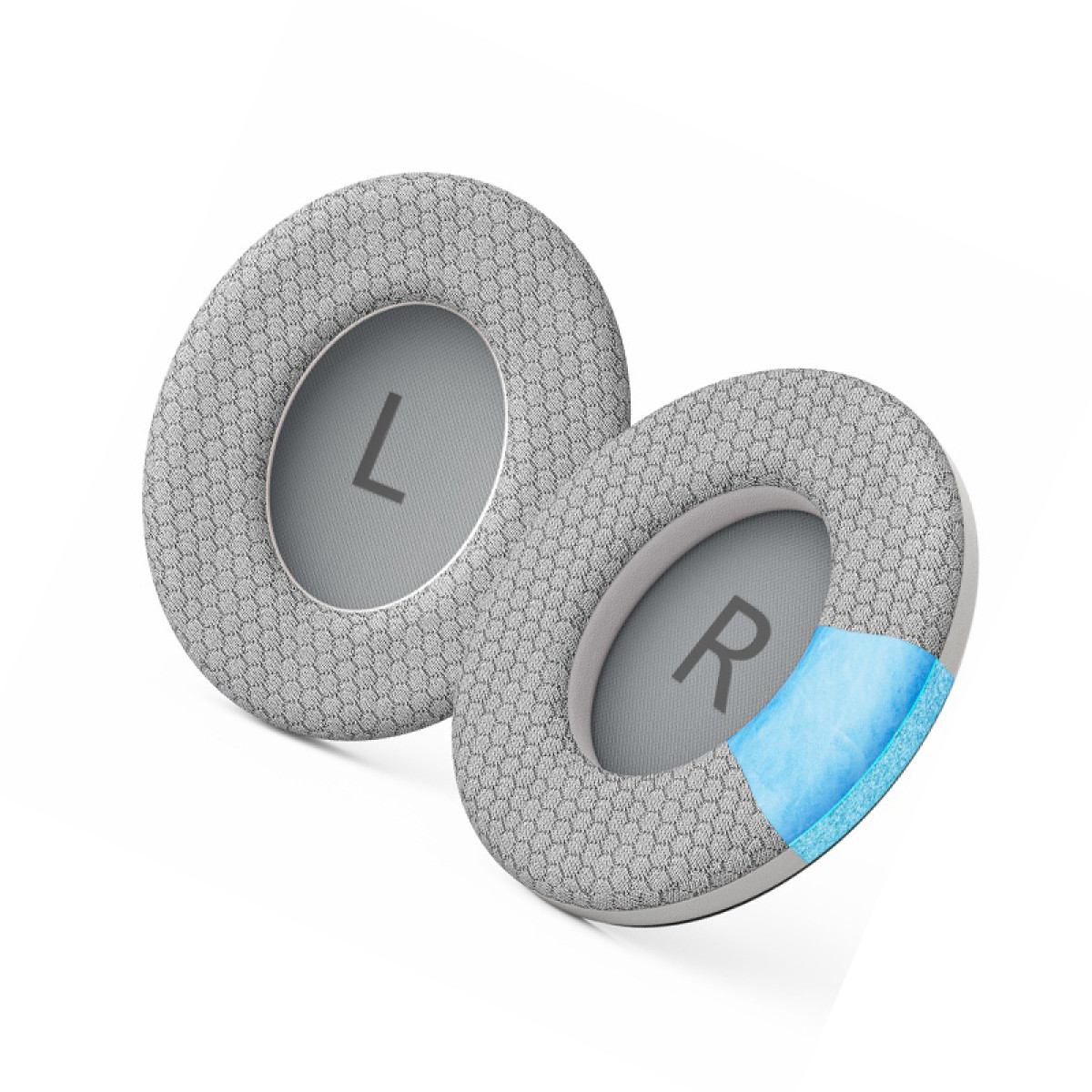 Due cuscinetti auricolari grigi per cuffie su sfondo bianco. Uno ha una 'L', l'altro 'R'. Una striscia blu è visibile sul cuscinetto 'R'.