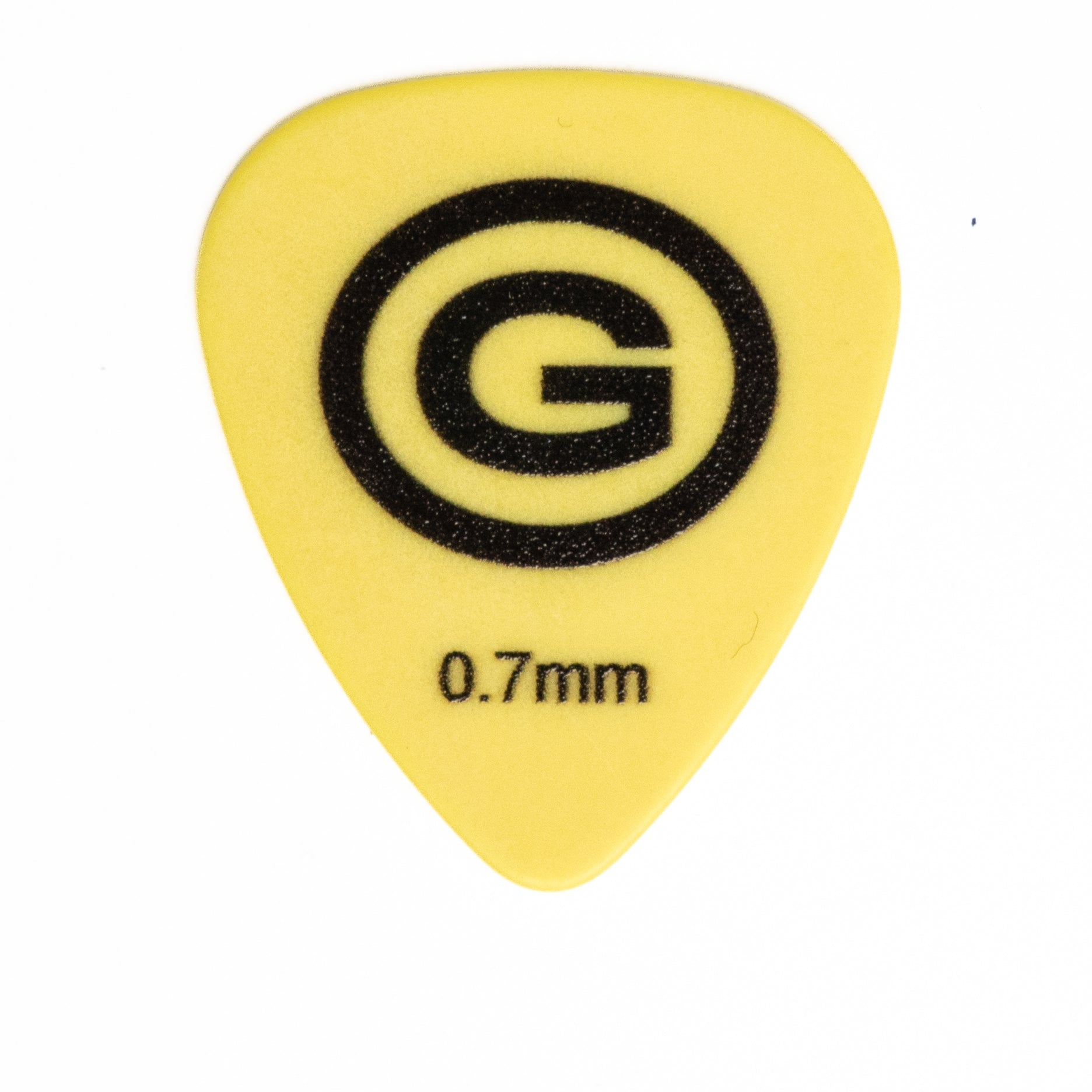 Ein gelbes Plektrum mit einem schwarzen 'G'-Logo und dem Text '0,7 mm'. Es befindet sich auf weißem Hintergrund.