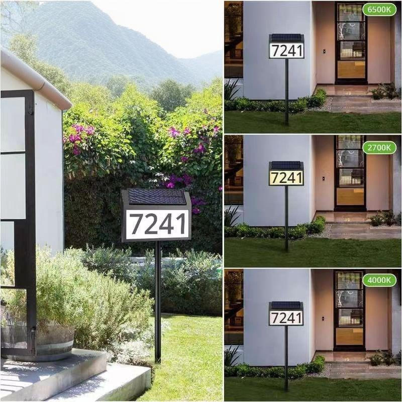 Ein Straßenschild mit der Nummer 7241. Es gibt drei Beleuchtungsoptionen und einen Berg im Hintergrund.