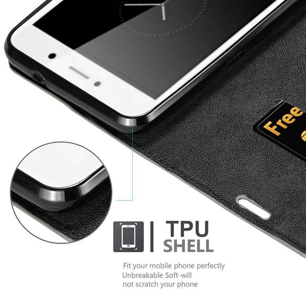 Un telefono in una custodia nera. Lo schermo è visibile. La custodia ha uno slot per schede con una scheda "Free". Testo: TPU SHELL.