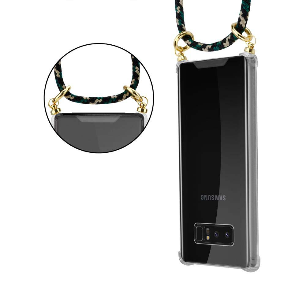 Un telefono Samsung in una custodia trasparente con un cordino. Il cordino è verde e nero. Il telefono ha una fotocamera e il logo Samsung.