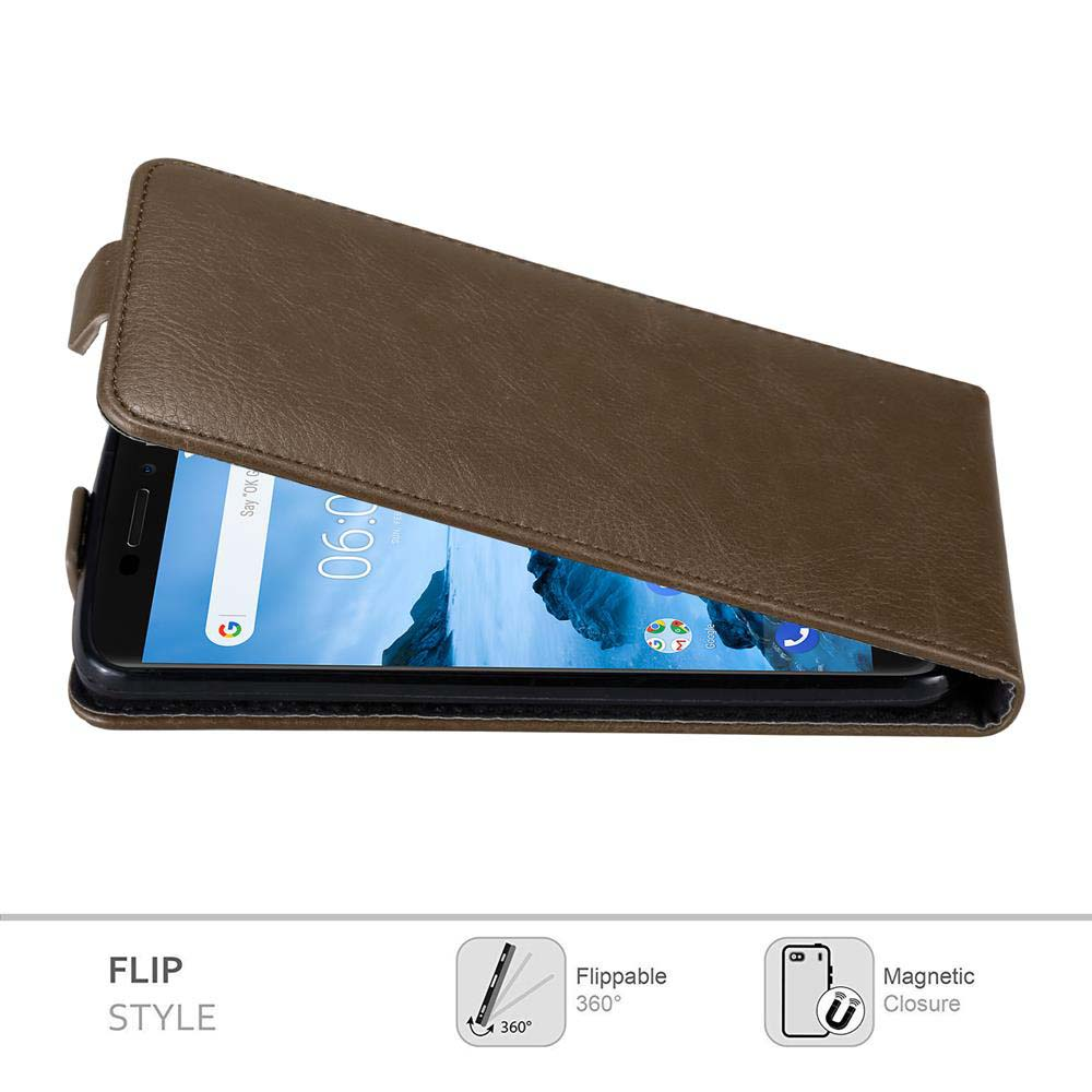Una custodia a libro marrone copre parzialmente uno smartphone. Lo schermo mostra l'ora 06:00. La custodia ha il testo 'FLIP STYLE'.
