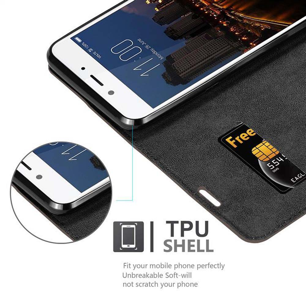 Un telefono che mostra le 11:00 è in una custodia nera con una carta 'Free'. La custodia ha l'etichetta TPU SHELL.
