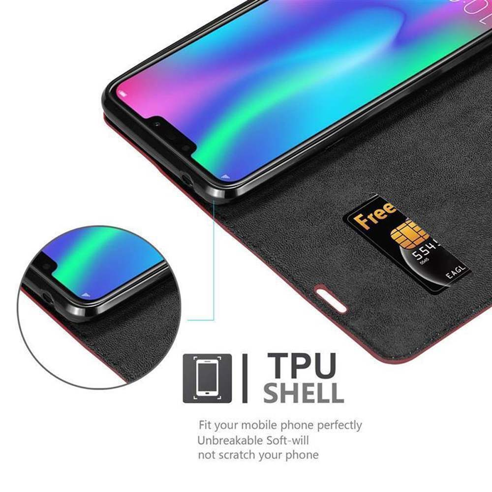 Ein Telefon in einer schwarzen Hülle mit farbigem Bildschirm. Eine SIM-Karte mit dem Wort 'Free' ist sichtbar. Die Hülle hat ein TPU SHELL Etikett.