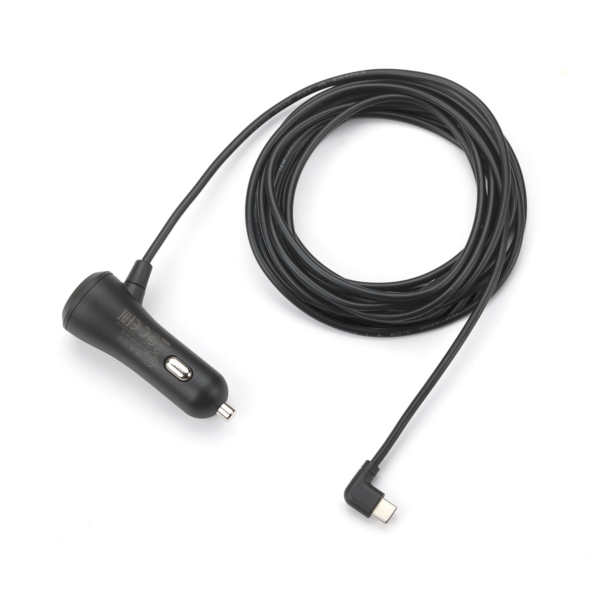 Ein schwarzes Autoladegerät mit aufgerolltem Kabel. Rechts befindet sich ein USB-C-Anschluss. Das Ladegerät befindet sich links.
