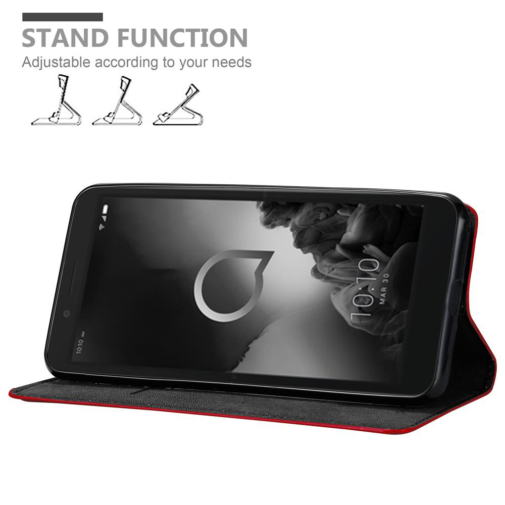 Ein Telefon in einer schwarzen Hülle mit roter Einfassung. Auf dem Bildschirm des Telefons wird ein Logo angezeigt. Text lautet 'Standfunktion'.
