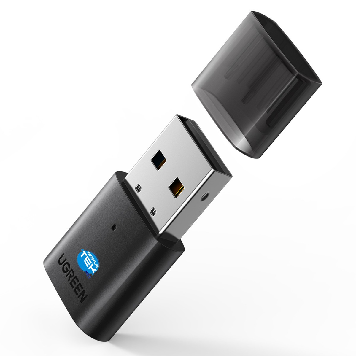 Un adaptador USB UGREEN negro con una tapa separada. El adaptador tiene un conector USB plateado y el logotipo de UGREEN es visible.