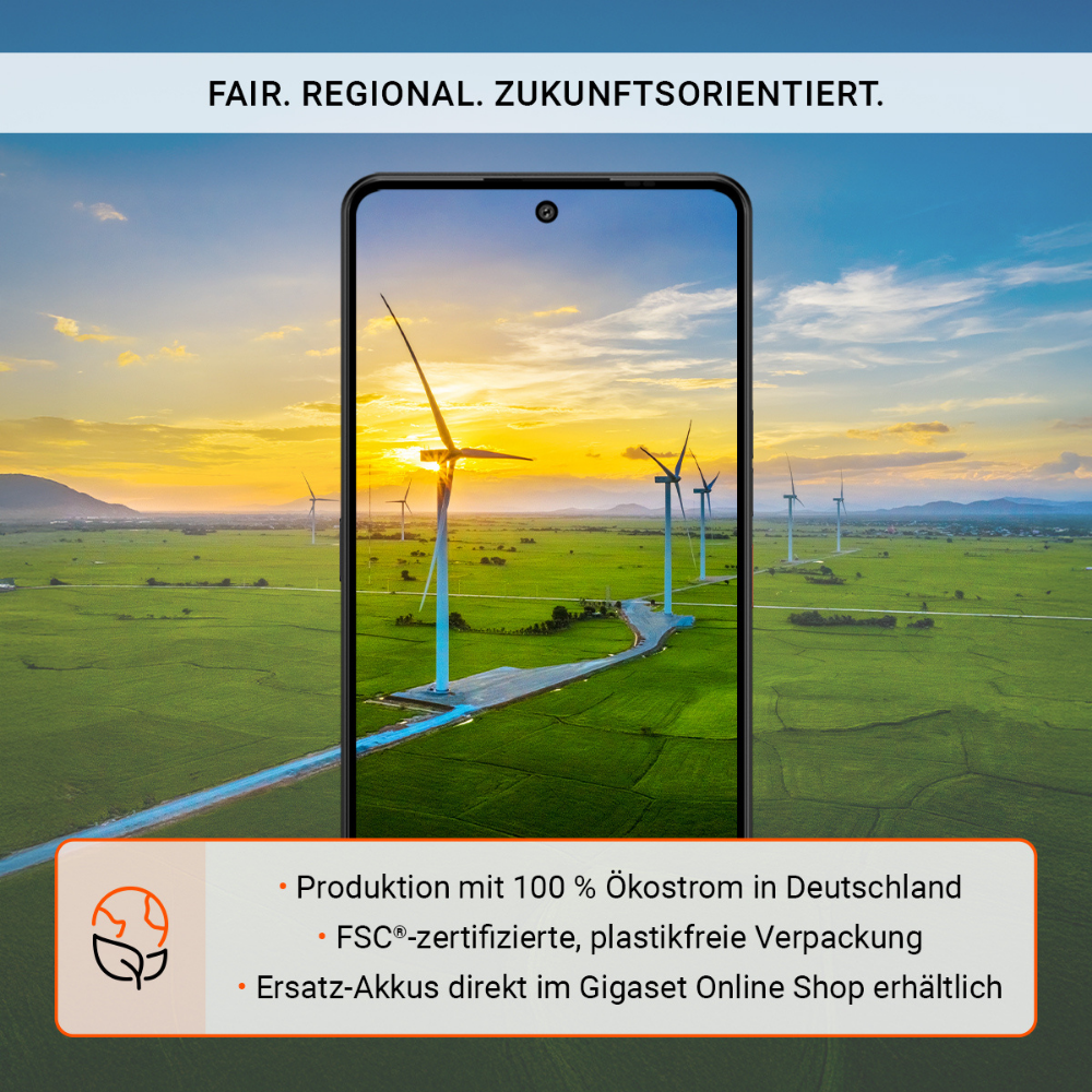 Telefon wyświetla turbiny wiatrowe o zachodzie słońca. Tekst: 'FAIR. REGIONAL. ZUKUNFTSORIENTIERT.' i szczegóły zrównoważonego rozwoju.