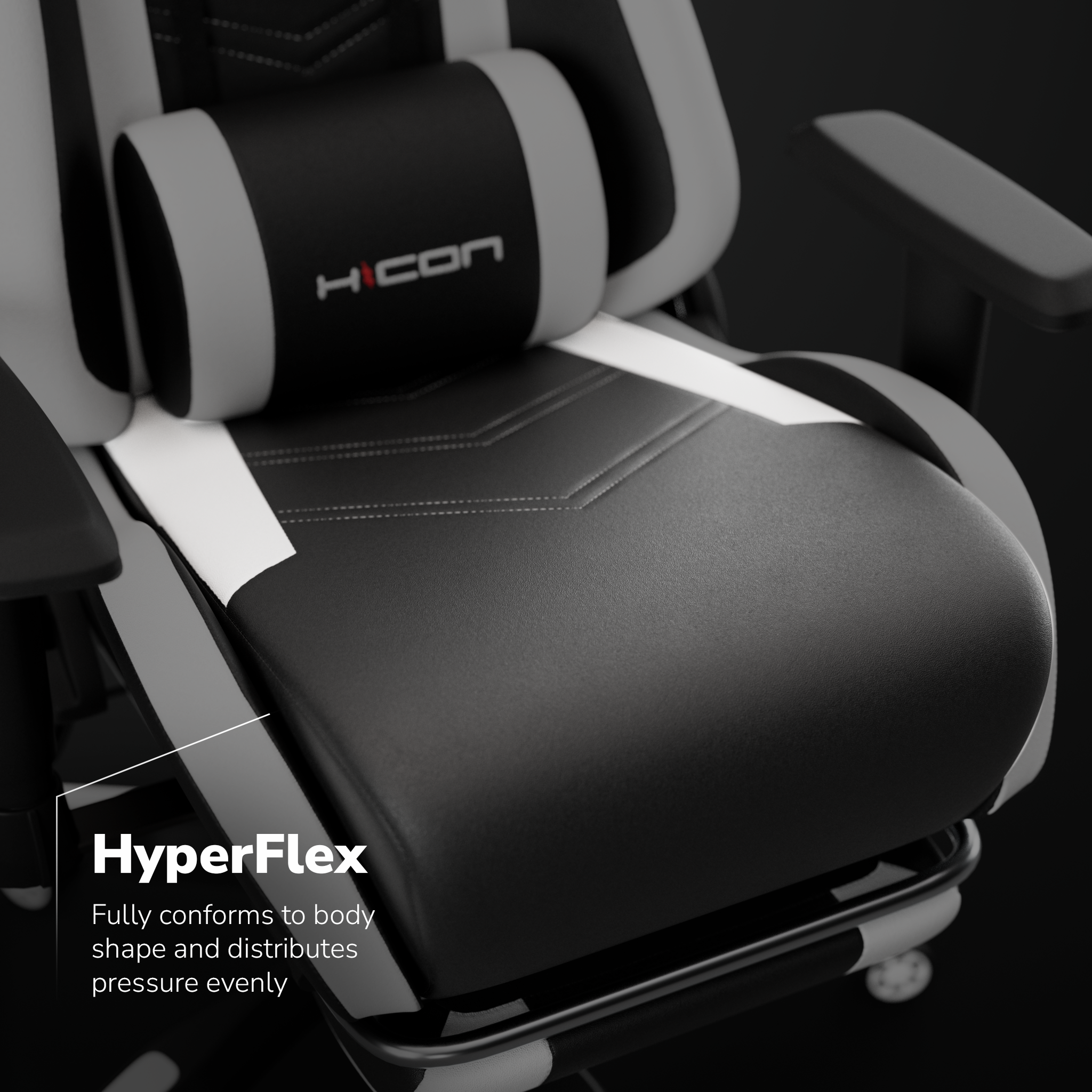 Gaming chair with black seat and back, white and gray accents, and the 'HICON' logo. The chair is in a dark environment.