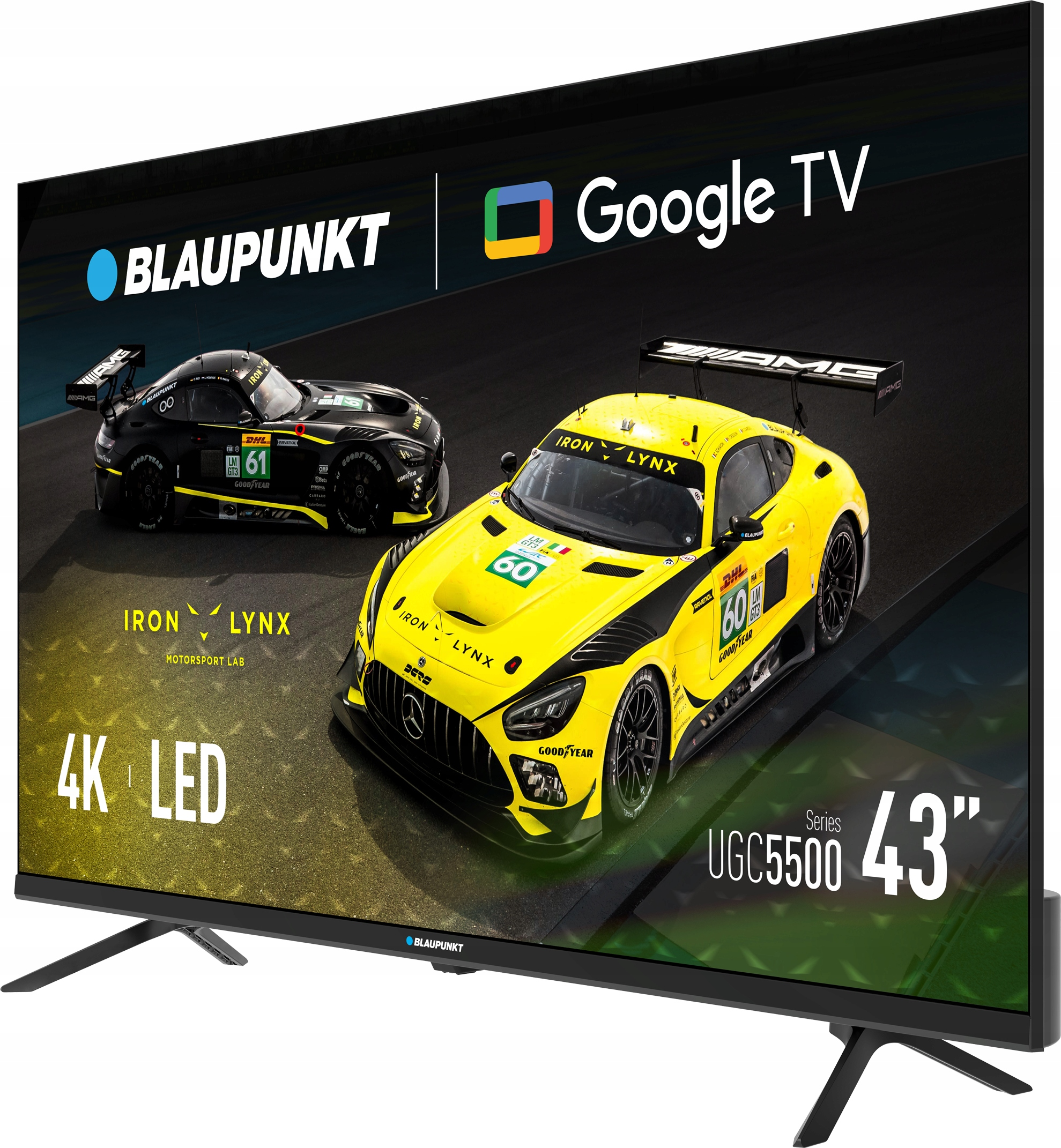 Telewizor Blaupunkt 43" wyświetla dwa samochody wyścigowe, jeden czarny, drugi żółty. Ekran pokazuje Google TV i szczegóły 4K LED.