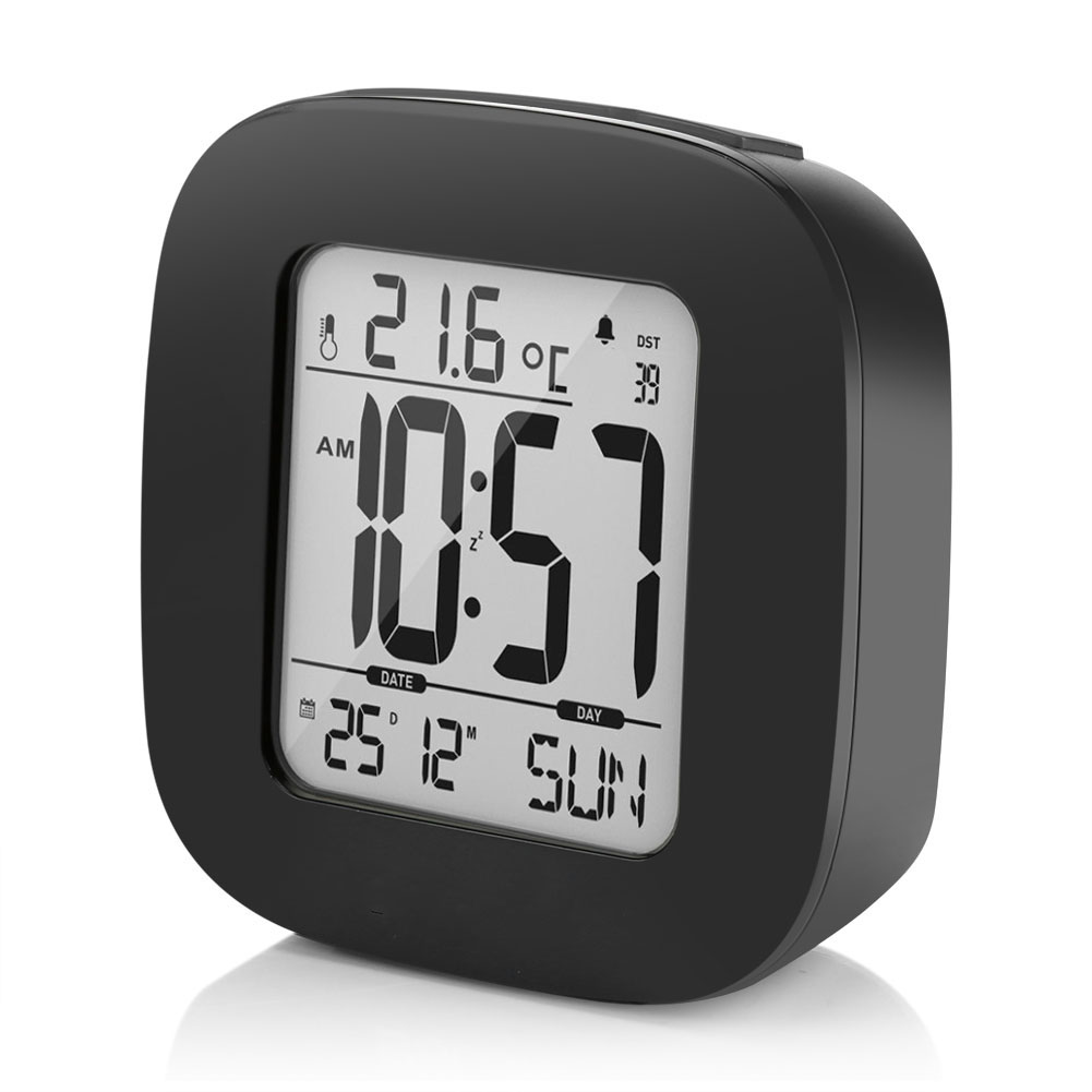 Schwarzer digitaler Wecker mit der Anzeige 10:57 Uhr, 21,6°C, Datum 25.12. und Sonntag. Die Uhr hat einen rechteckigen Bildschirm.