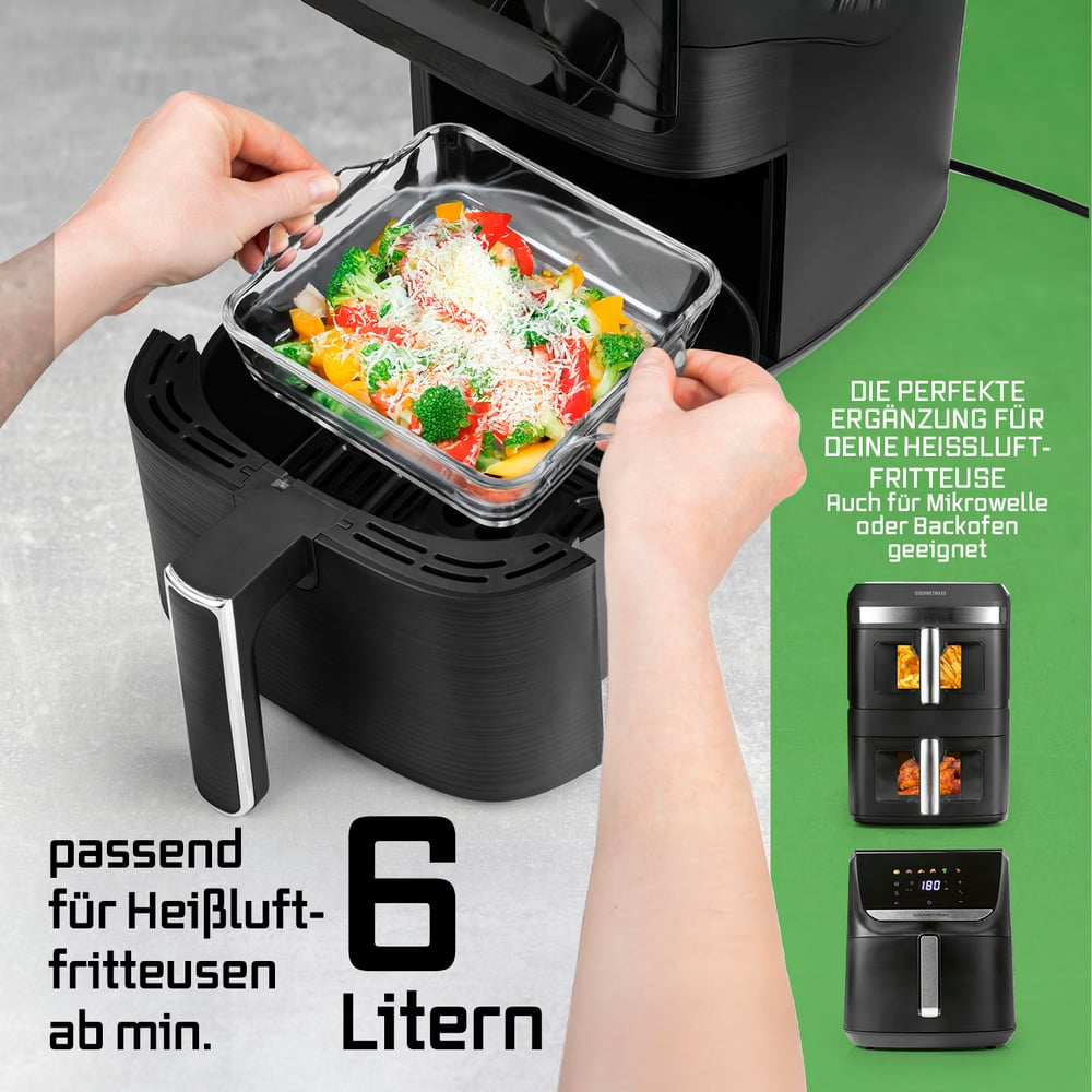 Hände halten eine Glasschale mit Gemüse und legen sie in eine schwarze Heißluftfritteuse. Text: '6 Liter'.