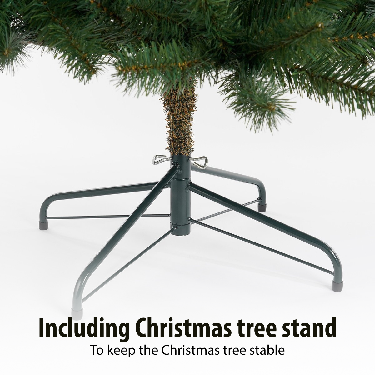 A green Christmas tree is on a dark green metal stand. The stand has legs and a central support. White background.