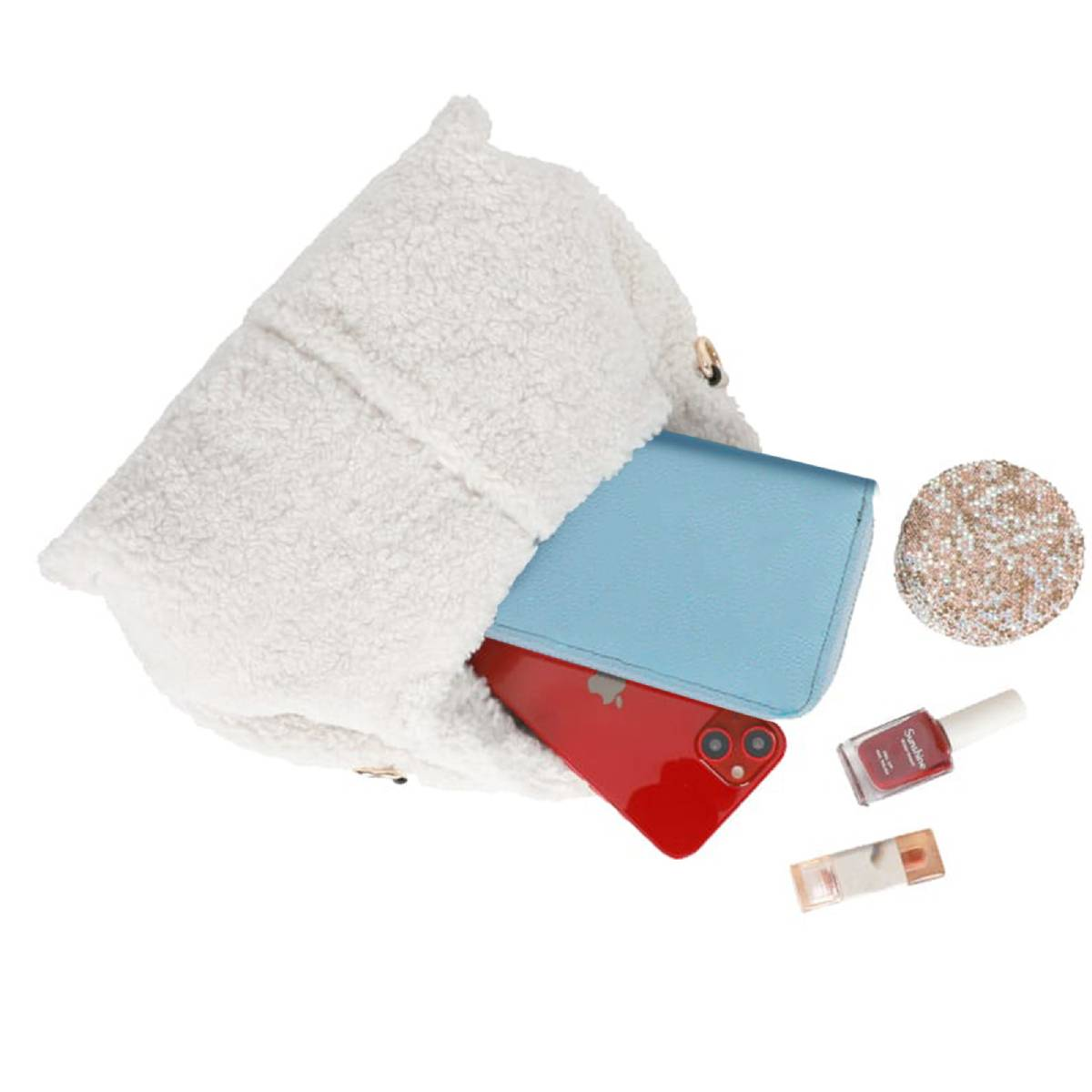 Eine weiße, pelzige Handtasche, geöffnet, mit einem blauen Portemonnaie und einem roten Telefon. Ein geschmückter Kreis, Nagellack und Lipgloss sind ebenfalls vorhanden.