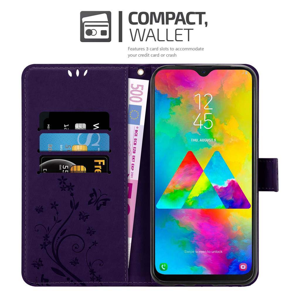 Portafoglio viola con telefono, carte di credito e banconota da 500 euro. Il telefono mostra l'ora e la data.