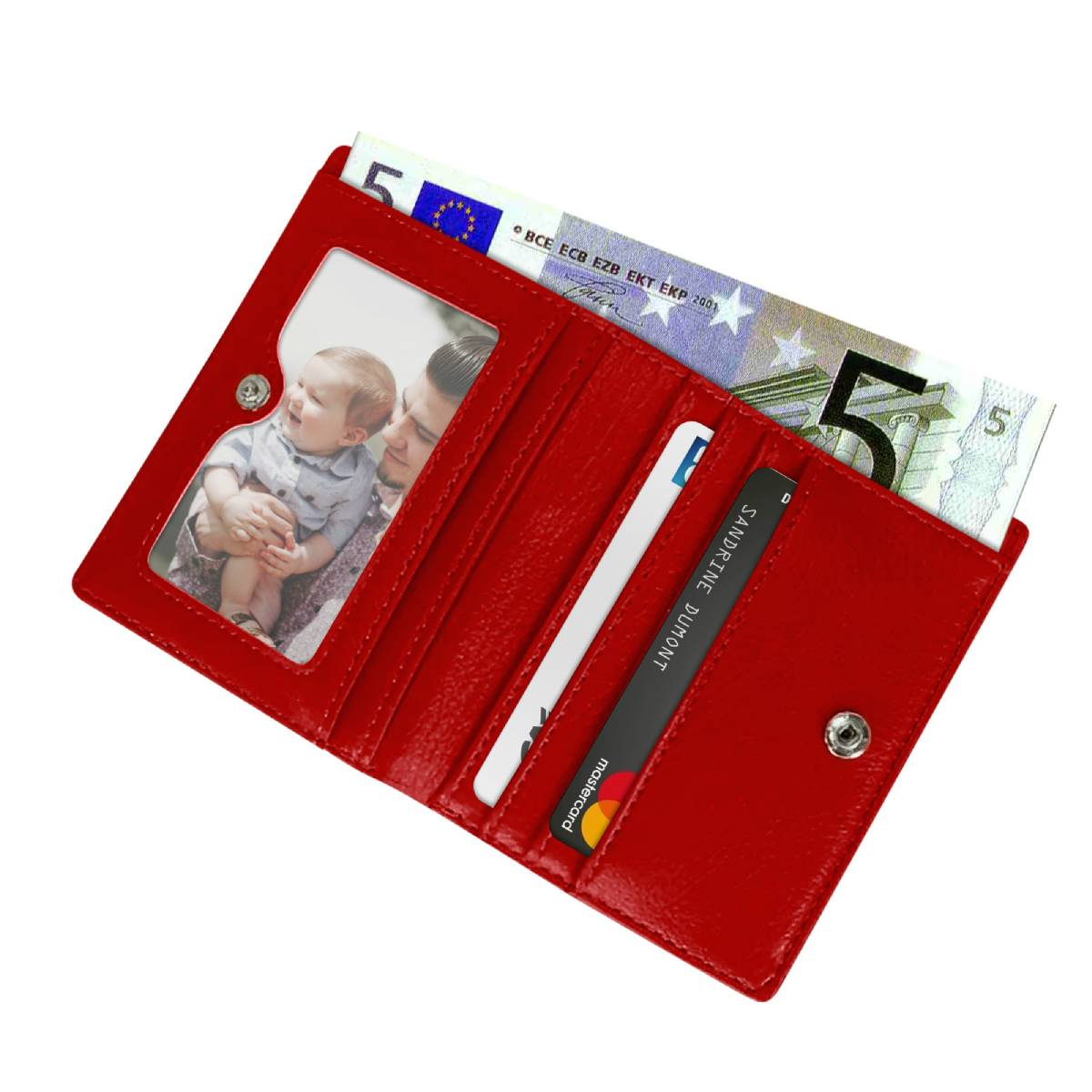 Eine rote Geldbörse mit Foto, Geld und Karten. Das Foto zeigt einen Mann mit einem Baby. Die Geldbörse ist offen.