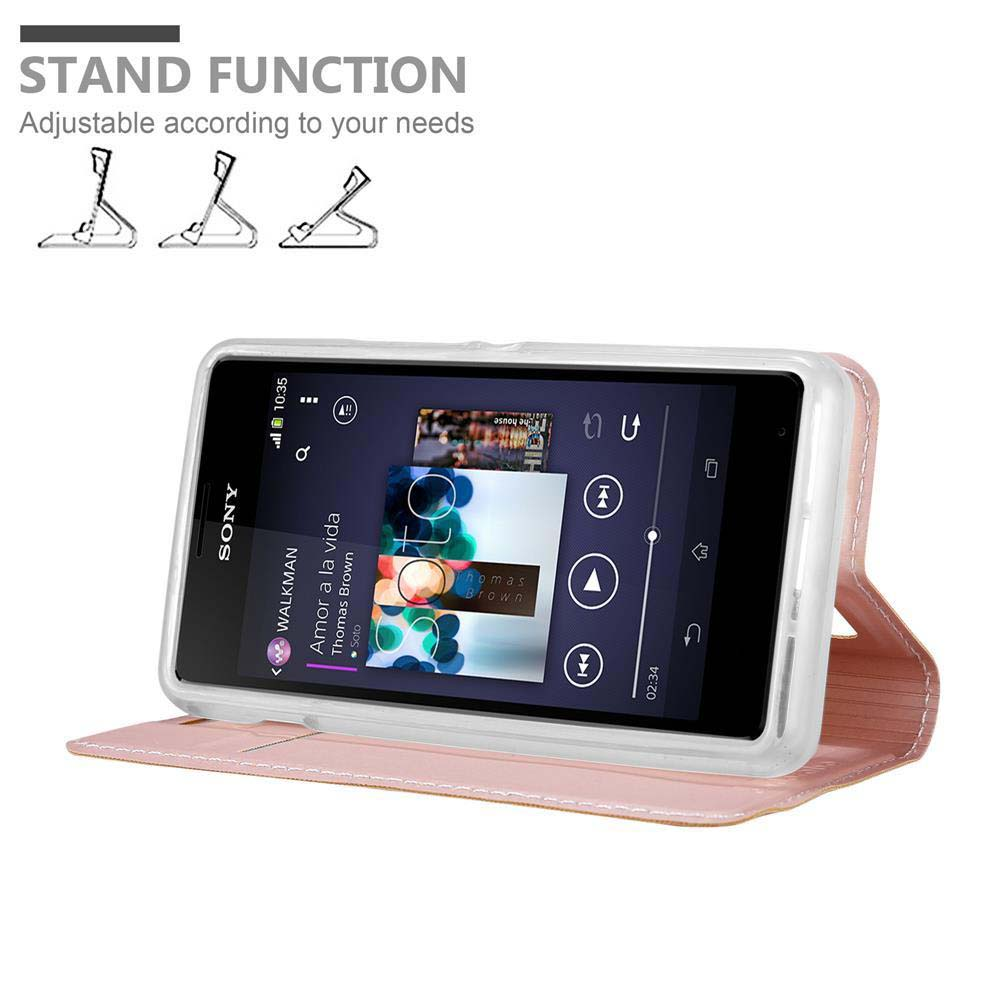 Un teléfono Sony, Amor a la Vida se está reproduciendo. Está en una funda rosa que se pliega para sostenerse.