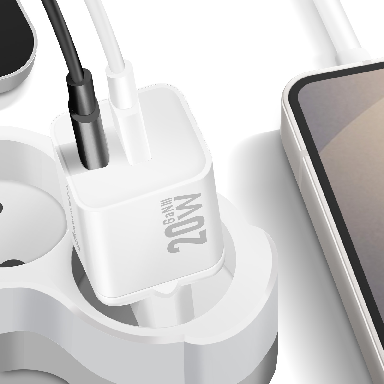 Un caricabatterie bianco con due cavi collegati e un telefono collegato. Il caricabatterie ha scritto 20W.
