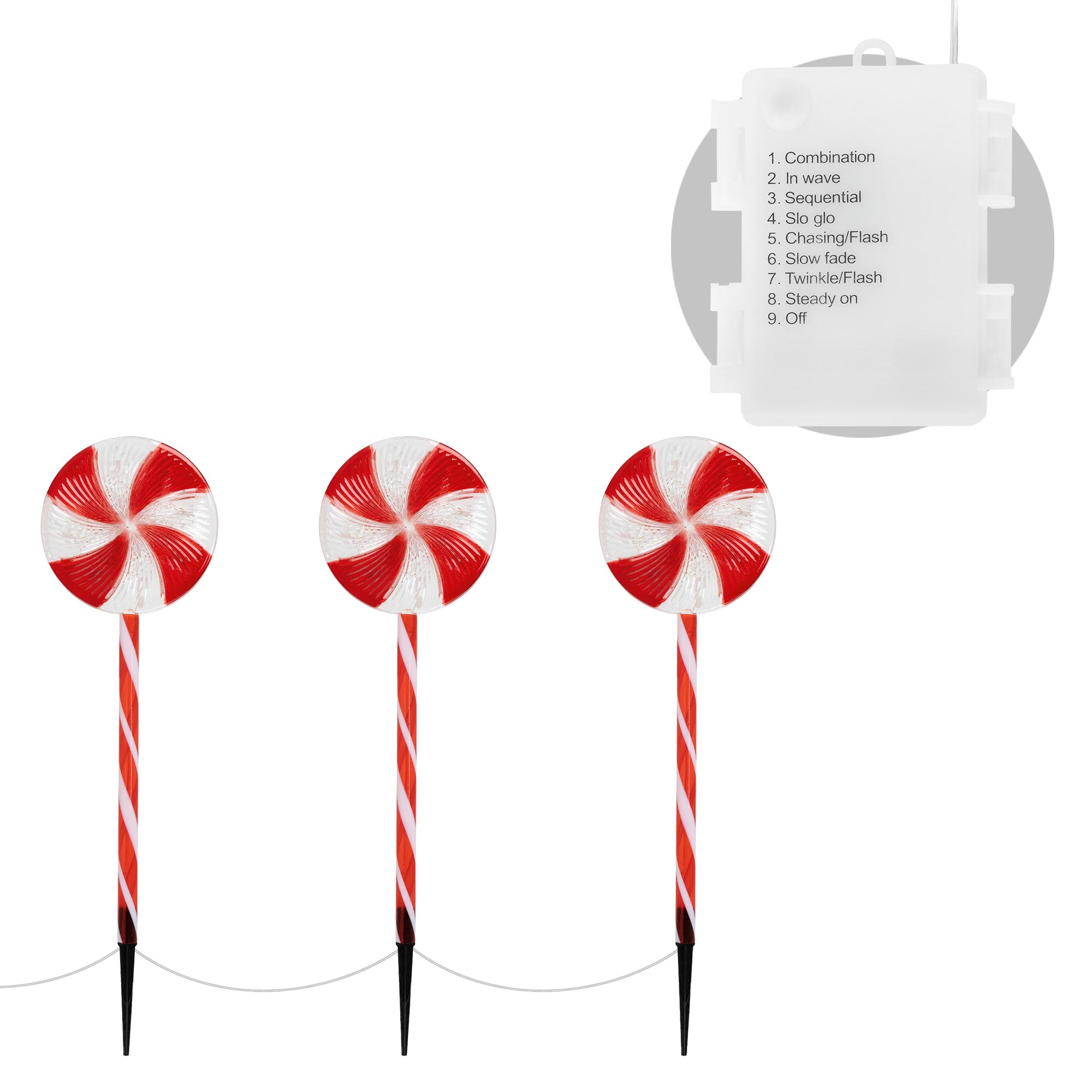 Drei Zuckerstangenlichter mit rot-weißen Spiralen. Darüber eine Steuerbox mit Lichtmodi-Optionen.