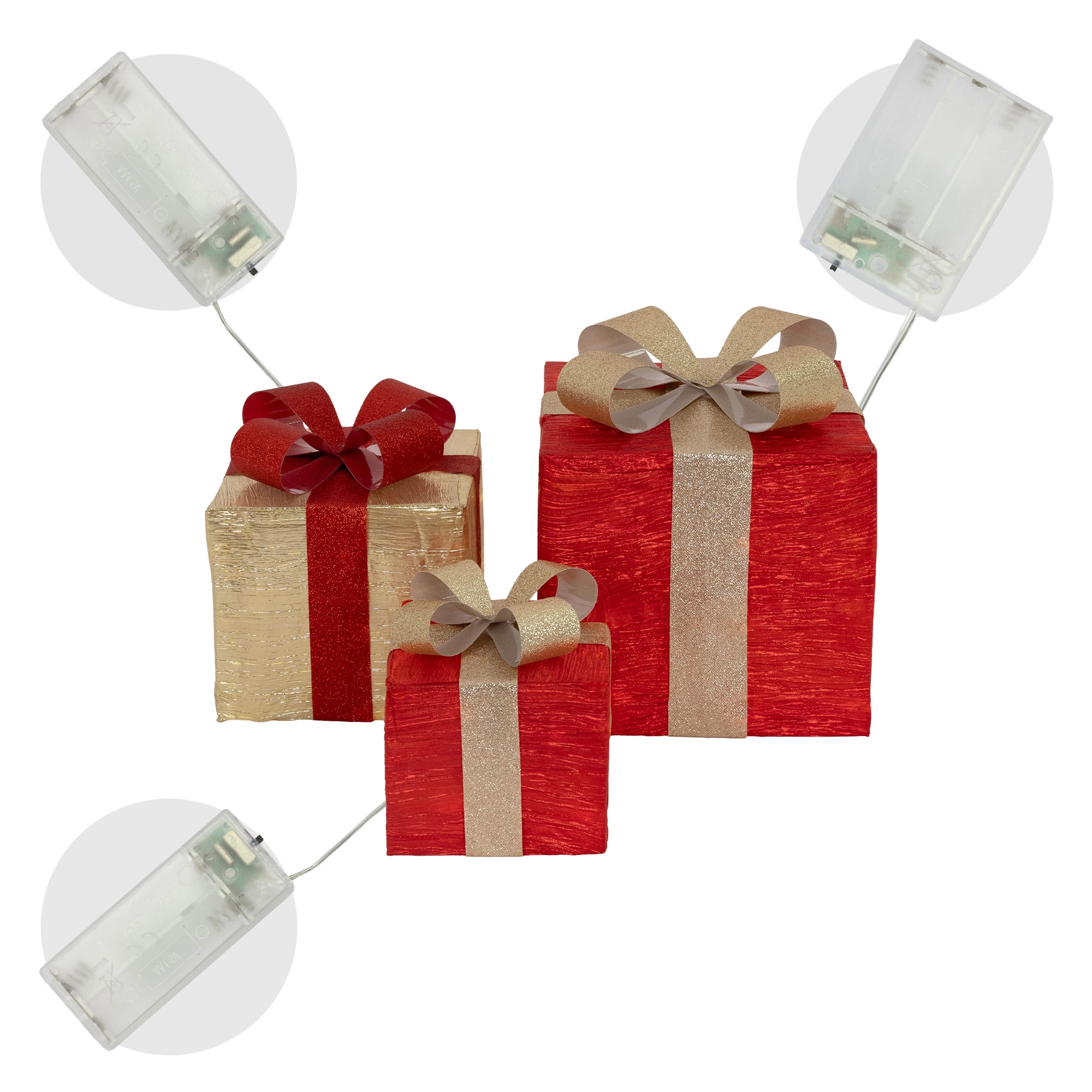 Drei Geschenkboxen: Gold und Rot mit Schleifen. Batteriepacks sind angeschlossen. Weißer Hintergrund.