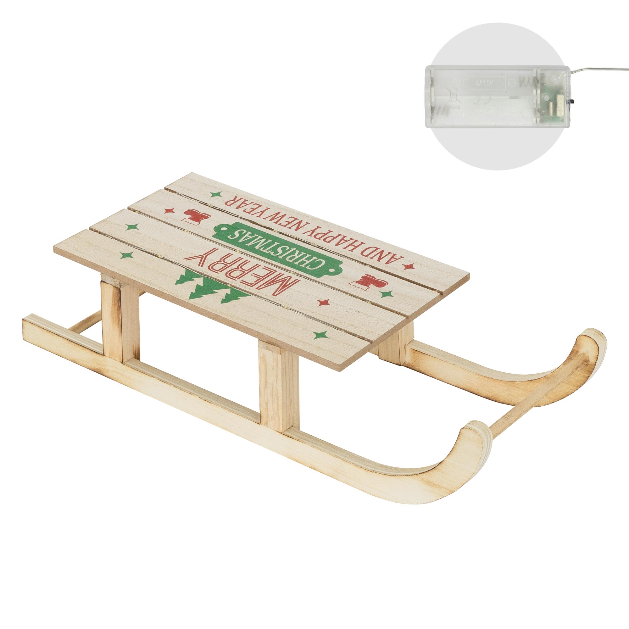 Weihnachtsschlitten aus Holz mit Merry Christmas-Text, grünen Bäumen und roten Sternen. Batteriepack oben rechts.