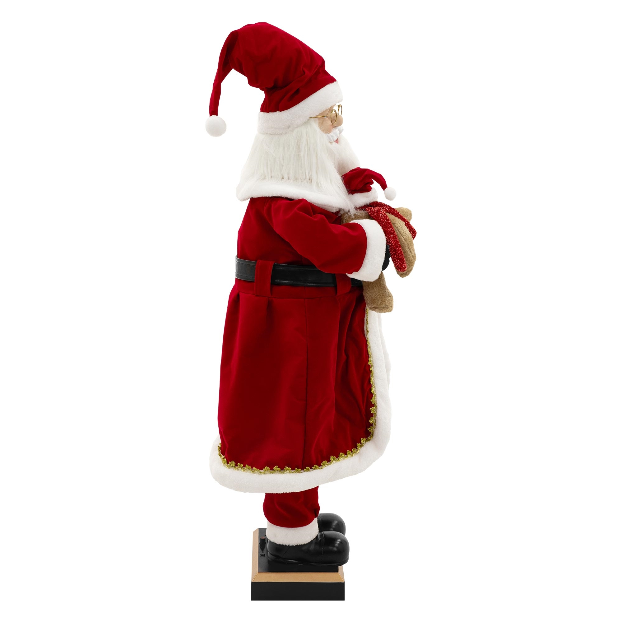 Weihnachtsmann-Figur, roter Mantel, Hut, hält ein Rentierspielzeug, schwarze Stiefel und weißer Bart. Vor weißem Hintergrund.