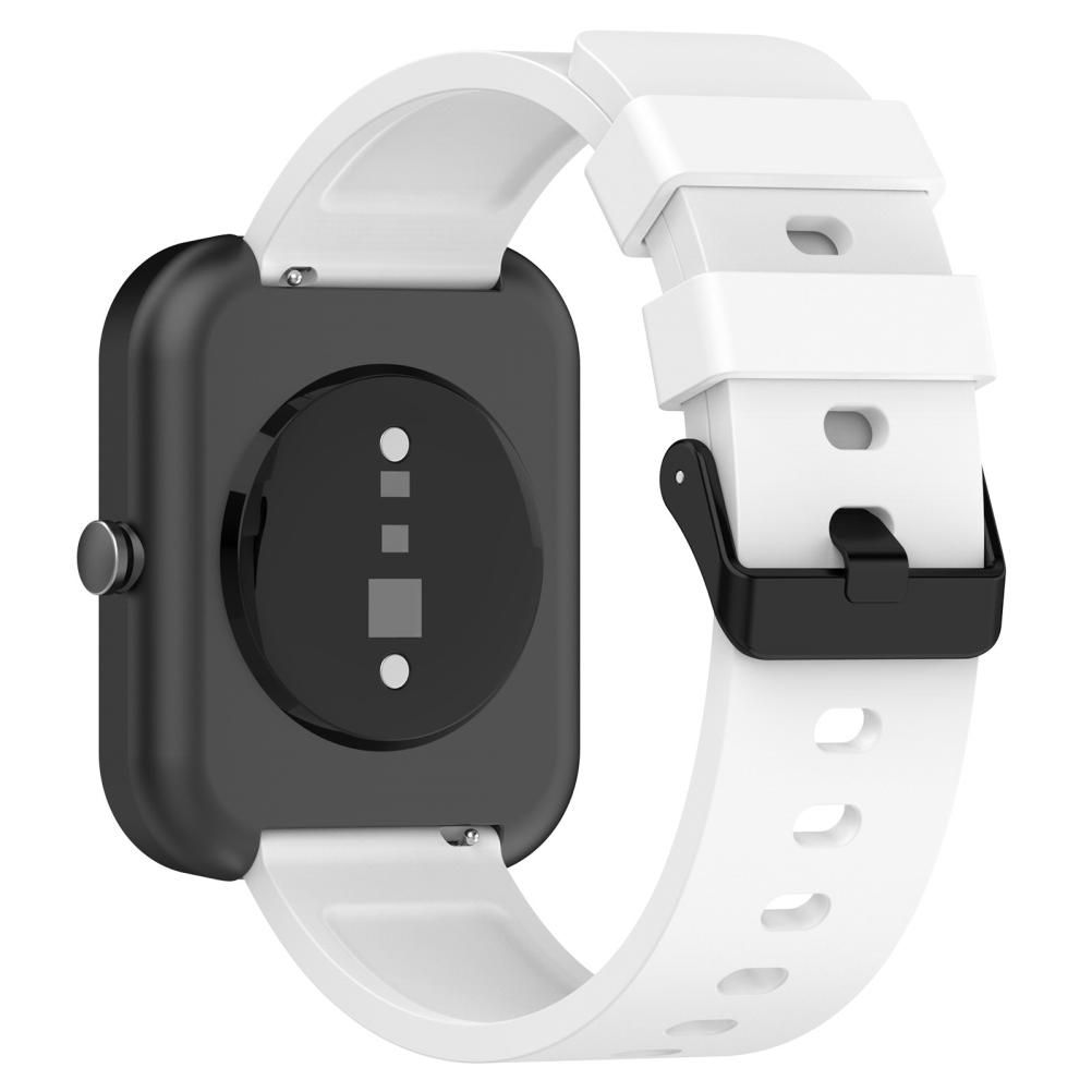 Eine weiße Smartwatch mit schwarzem Zifferblatt und weißem Armband. Die Uhr ist abgewinkelt, um die Rückseite mit Sensoren zu zeigen.