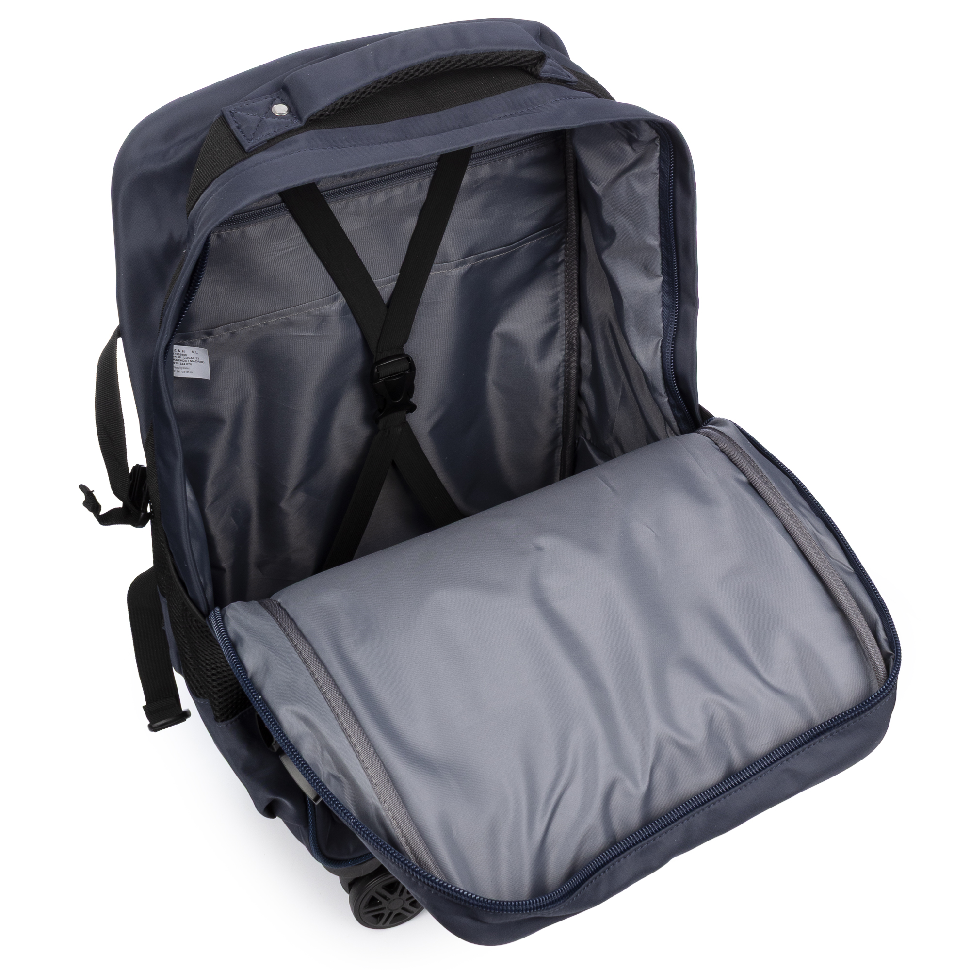 Zaino trolley blu navy aperto. Interno visibile con cinghie. Fodera grigia. Maniglia e cinghie nere. Sfondo bianco.