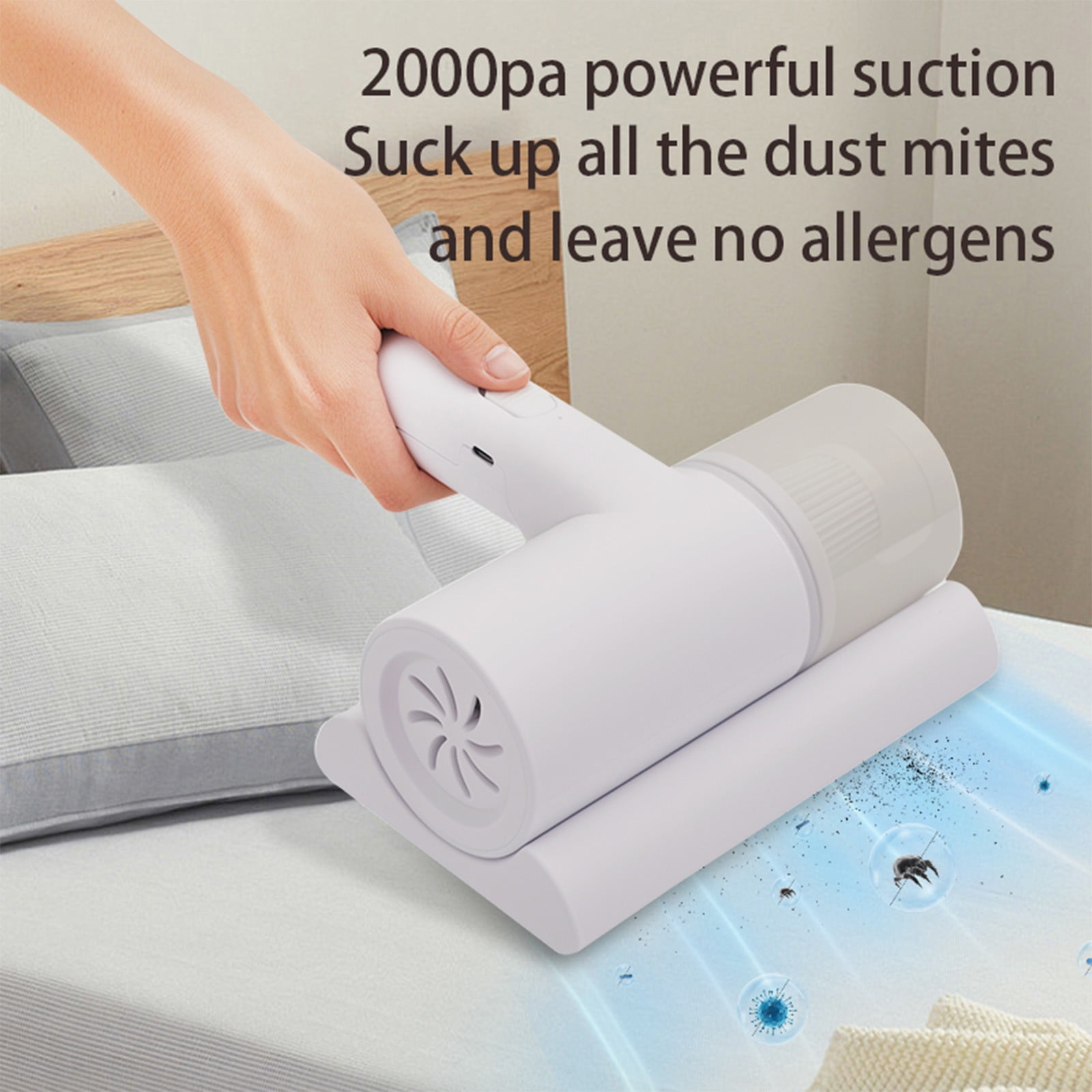 Eine Hand hält einen weißen Staubsauger über einem Bett. Text: 2000pa starke Saugleistung, saugt alle Hausstaubmilben auf.