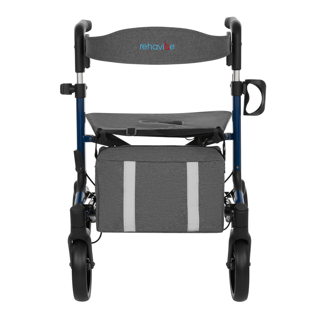 Ein grauer Rollator mit Sitz, Tasche und schwarzen Rädern. Er hat einen blauen Rahmen und den Markennamen 'rehavibe'.
