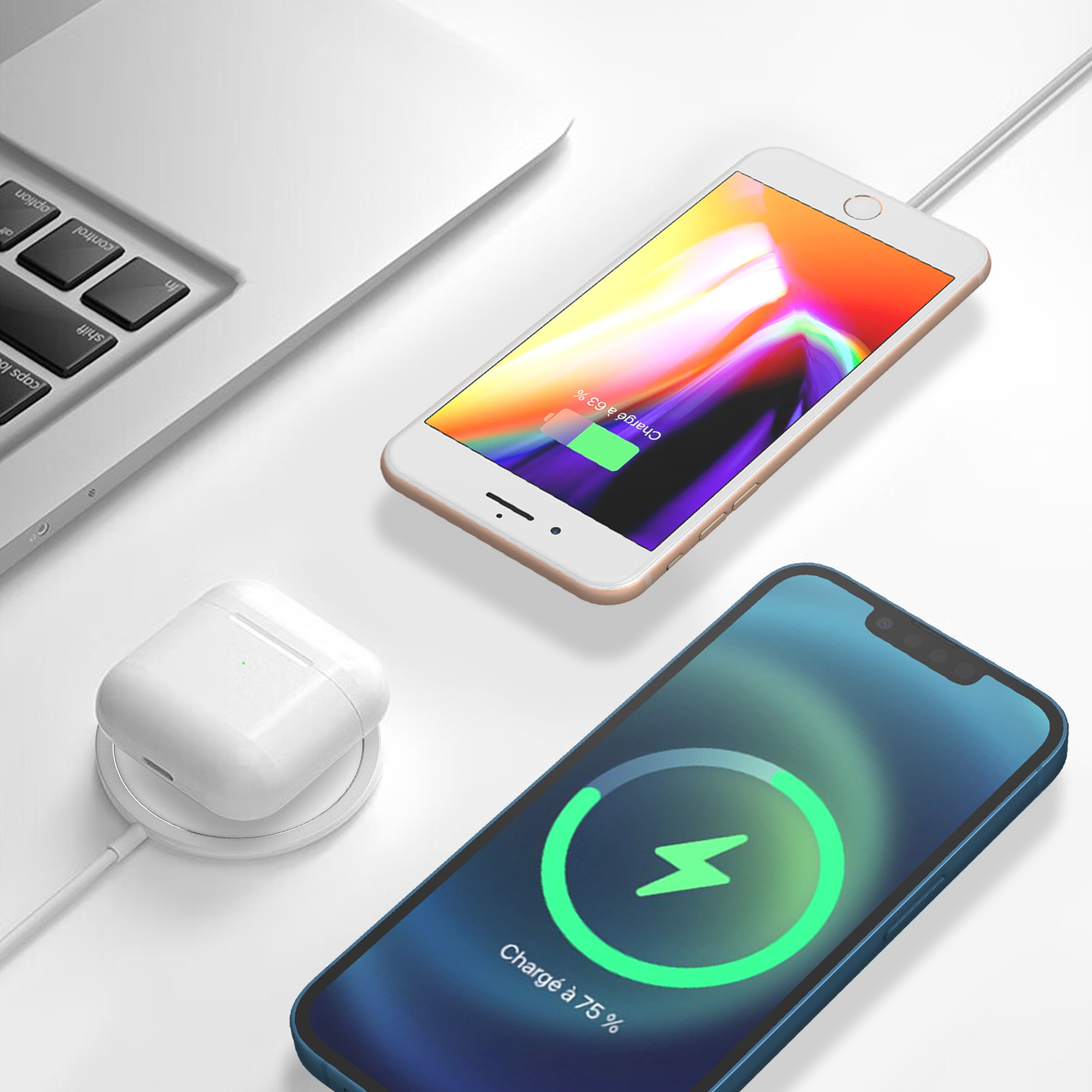 Teléfonos cargando sobre una superficie blanca. Un teléfono carga al 63%, el otro al 75%. También se ven AirPods y una laptop.