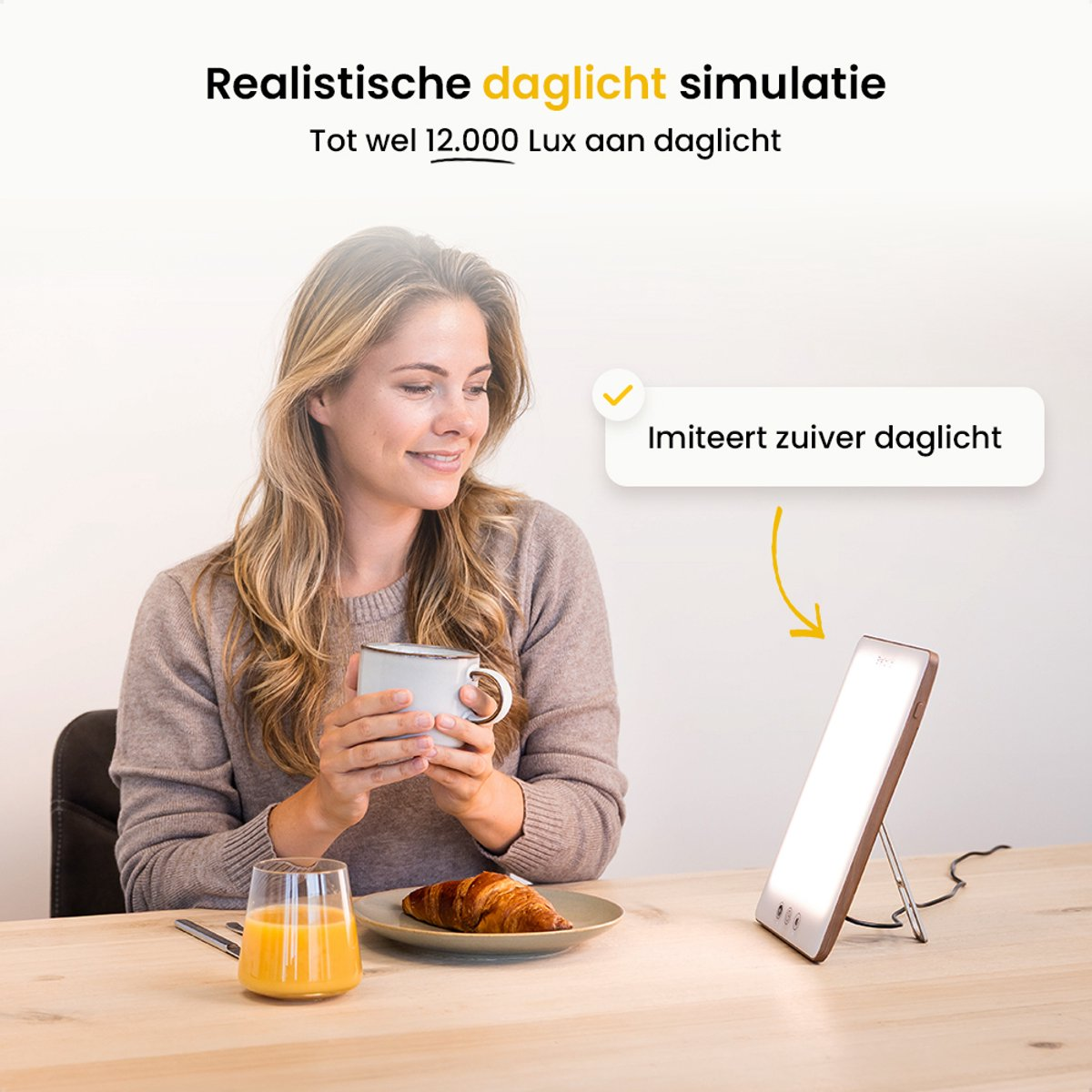Woman smiles, holding mug, breakfast on table, light therapy device. Text: Realistic daylight simulation.